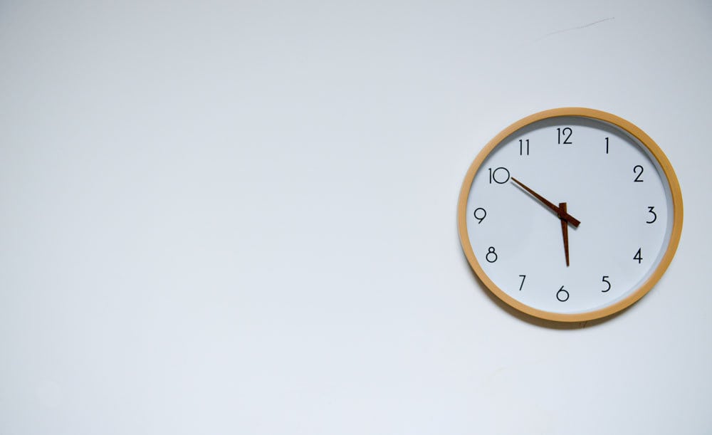 A clock hung on a wall