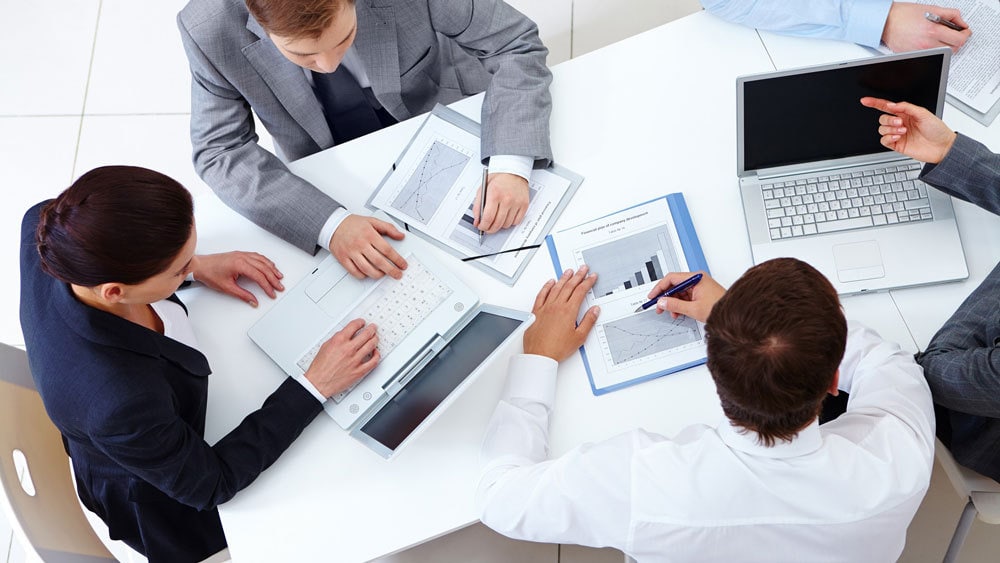 a group of employees (management consultants) working on a project